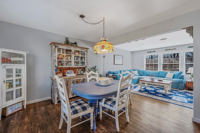 dining room featuring dark hardwood / wood-style flooring