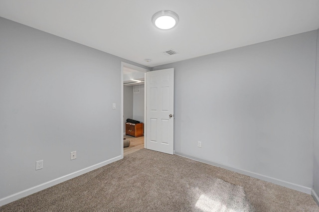 unfurnished bedroom with carpet