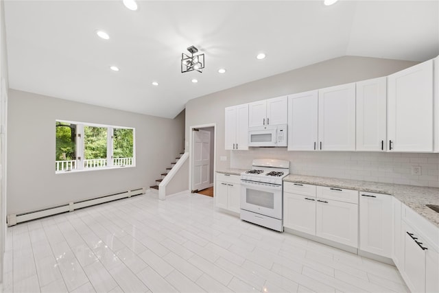 kitchen featuring white cabinets, white appliances, and a baseboard heating unit