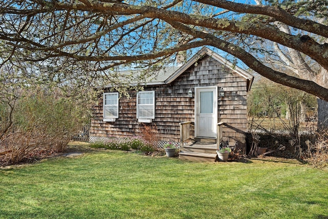 exterior space featuring a lawn