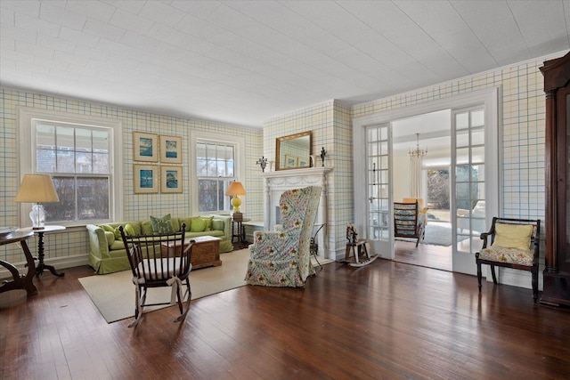 sitting room with hardwood / wood-style floors