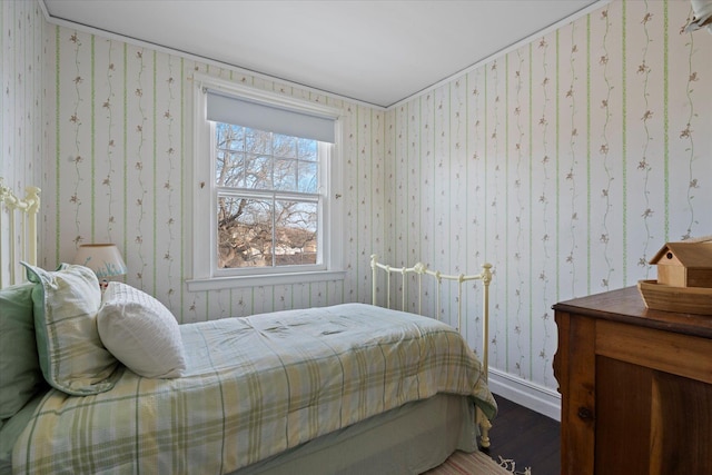 bedroom with hardwood / wood-style floors