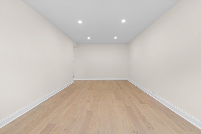 unfurnished room featuring light hardwood / wood-style flooring