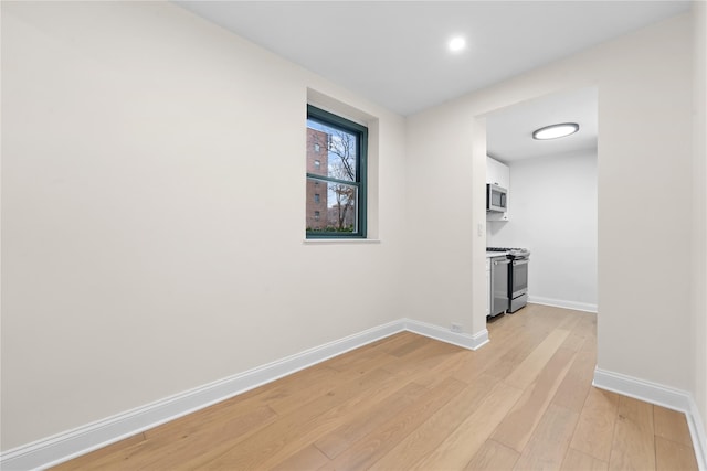 hallway featuring light hardwood / wood-style floors