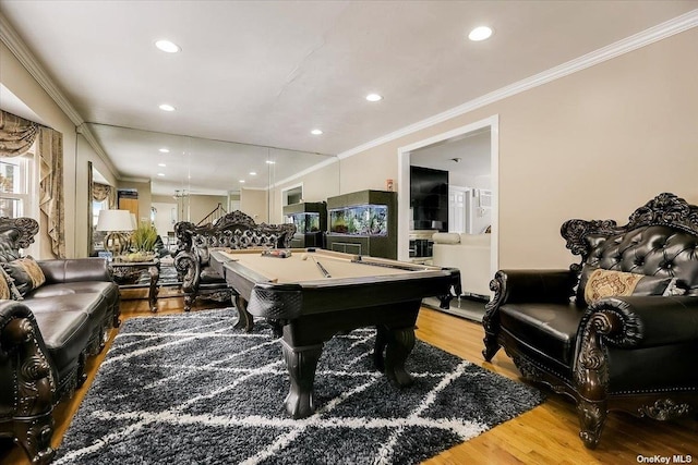 playroom featuring billiards, ornamental molding, and hardwood / wood-style floors