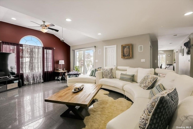 living room with lofted ceiling and ceiling fan