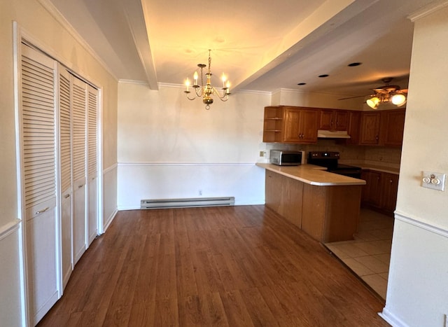 kitchen with wood-type flooring, decorative light fixtures, a baseboard radiator, kitchen peninsula, and black range with electric cooktop