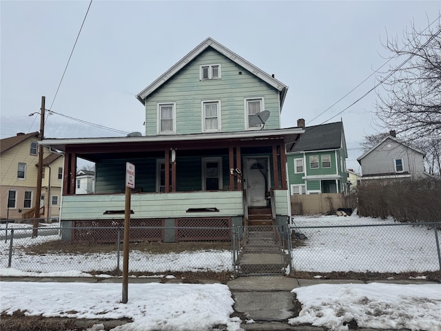 view of front of home featuring covered porch