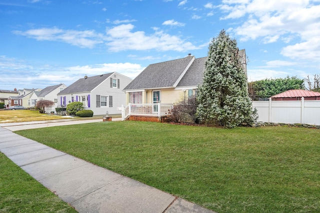 view of front of home with a front lawn