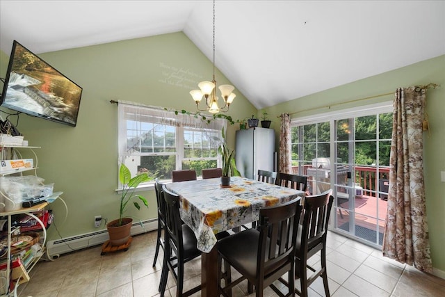 tiled dining room with an inviting chandelier, a baseboard heating unit, and plenty of natural light