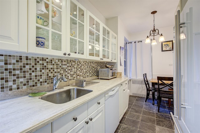 kitchen with sink, white cabinetry, dishwasher, pendant lighting, and light stone countertops