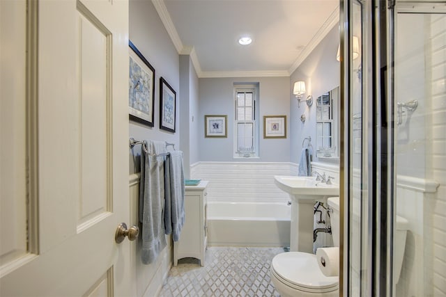 bathroom with crown molding, toilet, tile patterned flooring, and a washtub