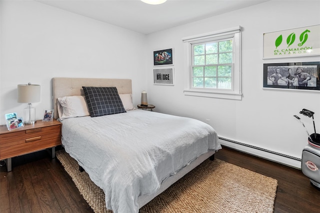 bedroom with dark hardwood / wood-style flooring and a baseboard radiator