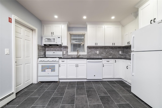 kitchen with sink, white appliances, a baseboard radiator, and white cabinets