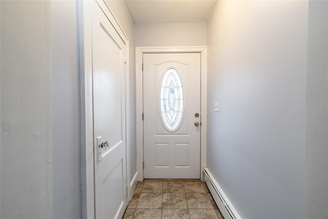 entryway featuring a baseboard heating unit and light tile patterned flooring