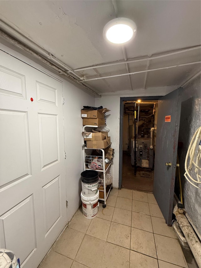 basement featuring tile patterned floors