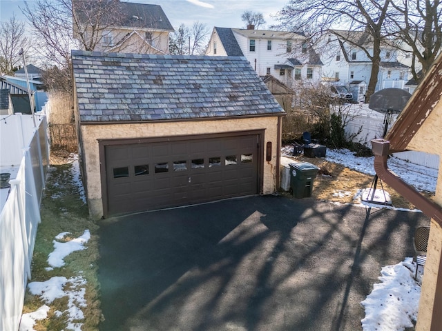 view of snow covered garage