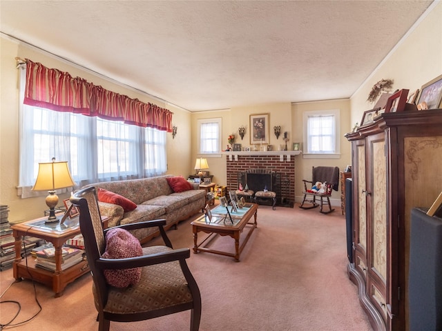 carpeted living room featuring a brick fireplace and a textured ceiling