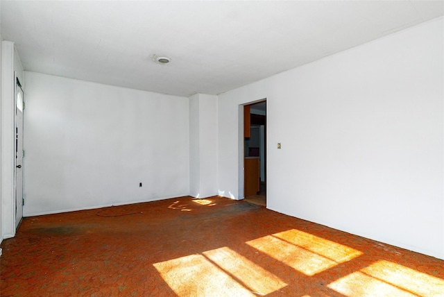 unfurnished room with carpet