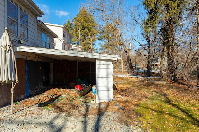 view of yard featuring a carport