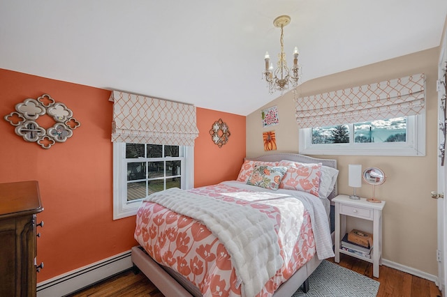 bedroom featuring a baseboard radiator, vaulted ceiling, dark wood-type flooring, and a notable chandelier