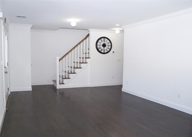 interior space with ornamental molding and dark hardwood / wood-style floors