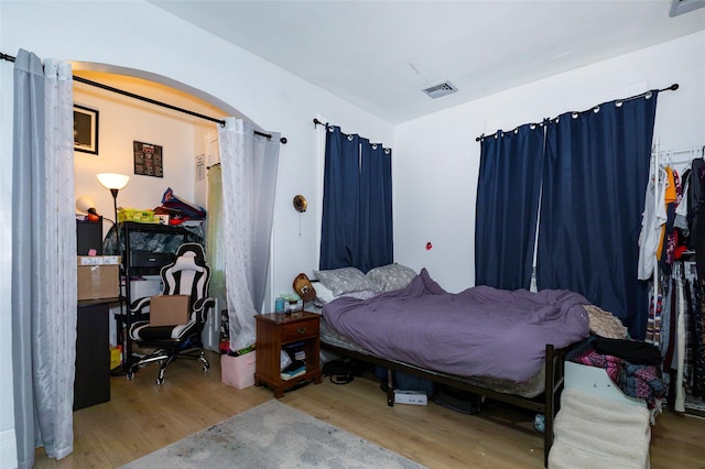 bedroom featuring hardwood / wood-style floors