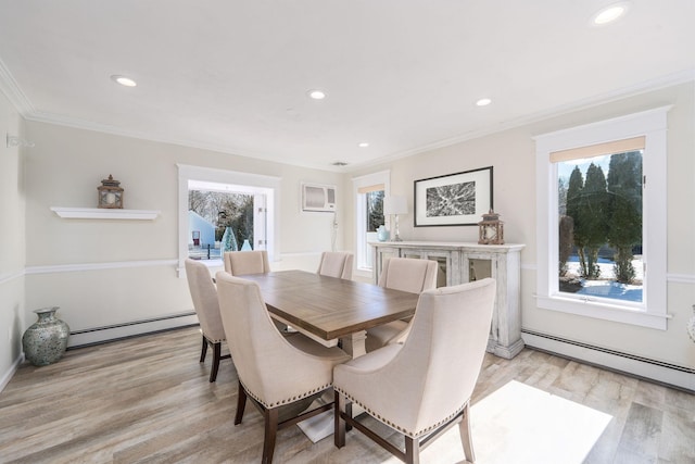 dining space featuring light wood-type flooring, a baseboard radiator, and ornamental molding