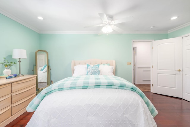 bedroom with ornamental molding, recessed lighting, dark wood finished floors, and ceiling fan