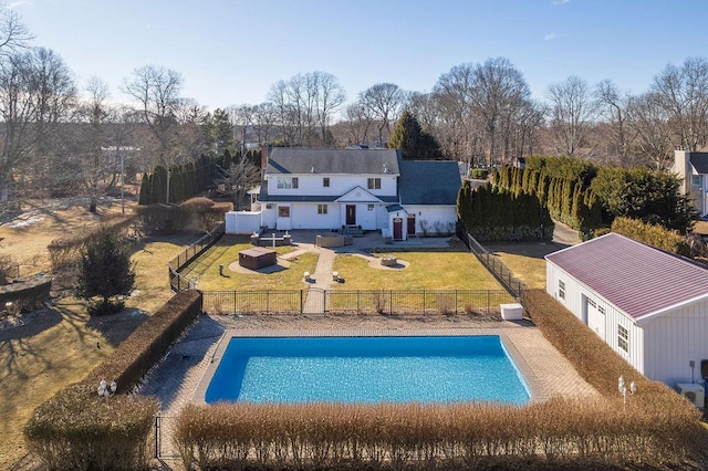 view of swimming pool featuring a yard, a patio, a fenced backyard, and a fenced in pool