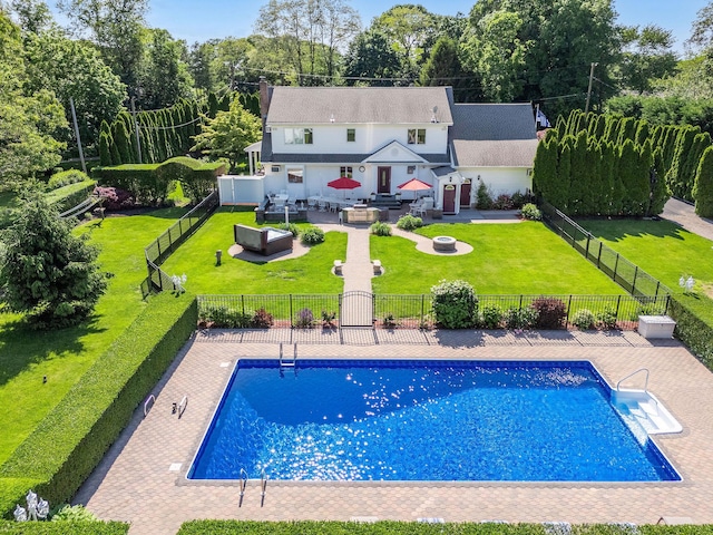 1125 Ole Jule Ln, Mattituck, NY 11952 - view of pool with a patio area and an outdoor living space with a fire pit