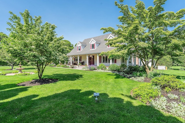 1125 Ole Jule Ln, Mattituck, NY 11952 - cape cod house with covered porch and a front lawn