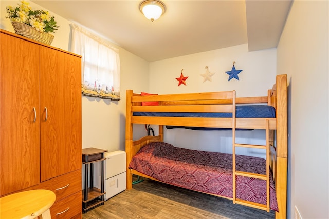 bedroom featuring hardwood / wood-style flooring