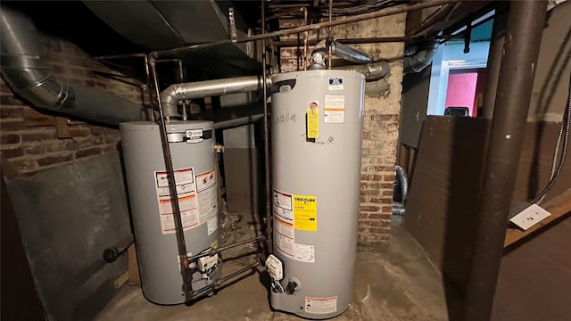 utility room featuring gas water heater