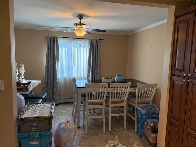 dining room featuring a baseboard radiator, ornamental molding, and ceiling fan