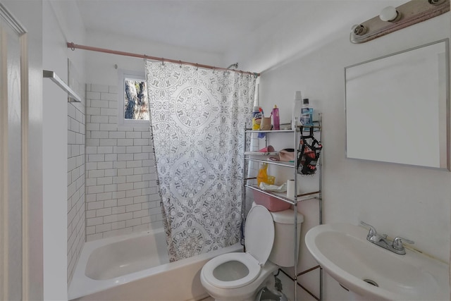 full bathroom featuring shower / bath combo, sink, and toilet