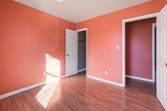 unfurnished bedroom featuring light hardwood / wood-style floors