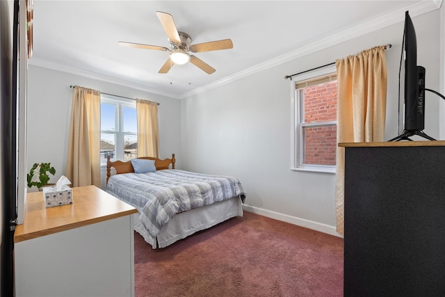 bedroom with ornamental molding, ceiling fan, and dark colored carpet