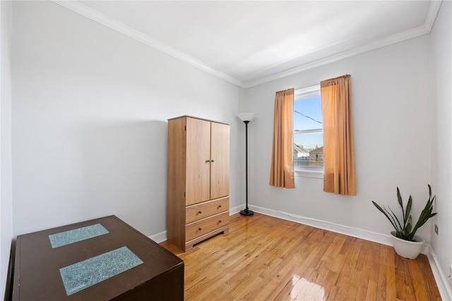 bedroom featuring crown molding and hardwood / wood-style flooring