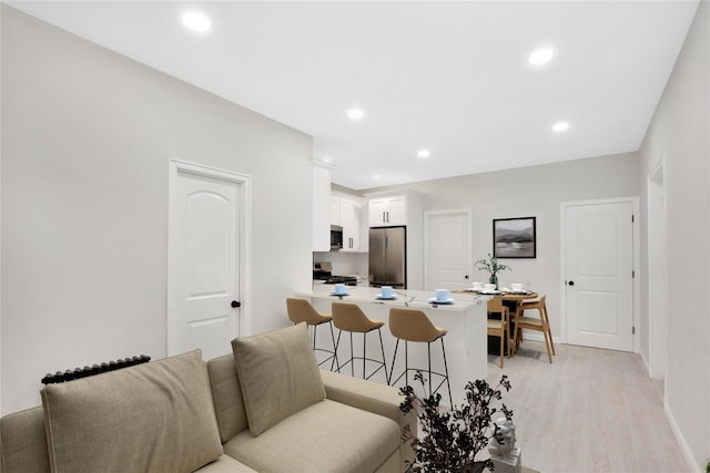 living room with light wood-type flooring