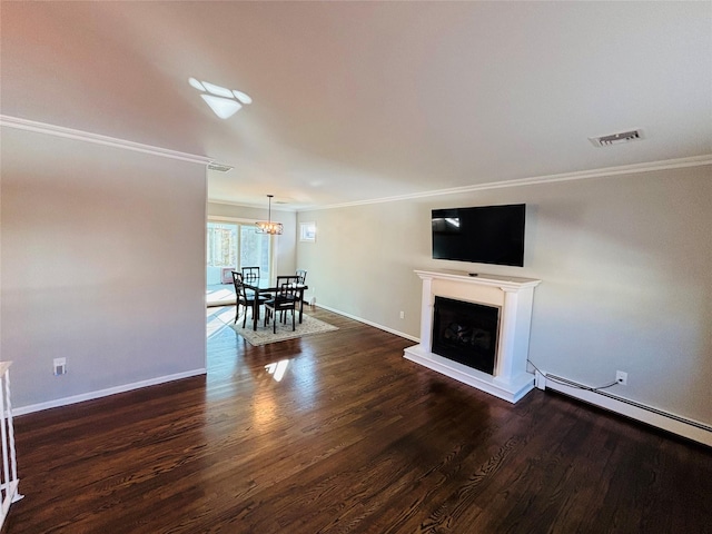 unfurnished living room with dark hardwood / wood-style flooring, a baseboard heating unit, and ornamental molding