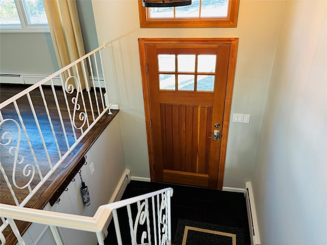 foyer featuring a baseboard radiator