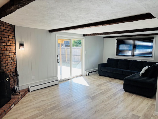 living room with beam ceiling, a baseboard radiator, a textured ceiling, and light hardwood / wood-style floors