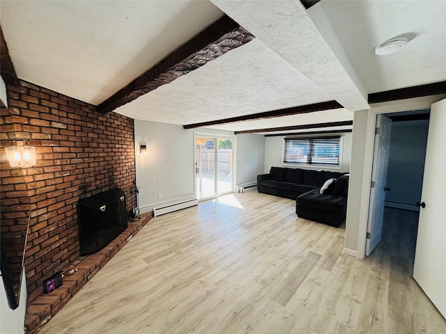 living room with beam ceiling, light wood-type flooring, a textured ceiling, and baseboard heating