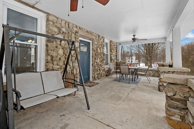 view of patio / terrace featuring ceiling fan