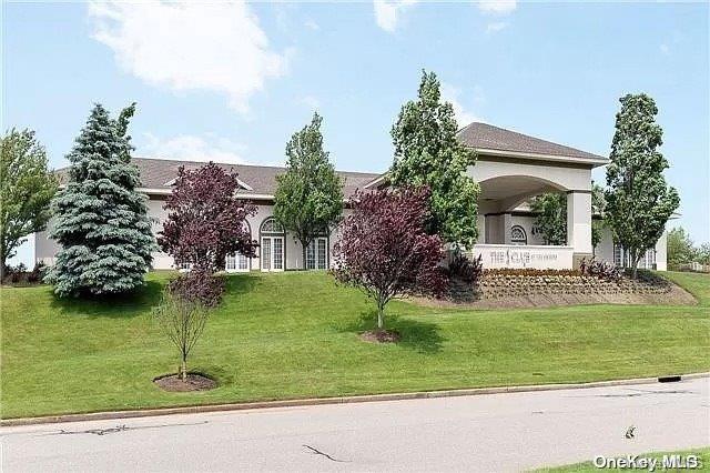 view of front of home with a front lawn