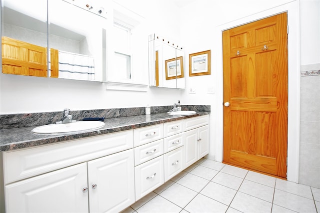 bathroom featuring vanity and tile patterned flooring