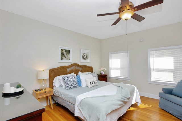 bedroom featuring ceiling fan and light wood-type flooring