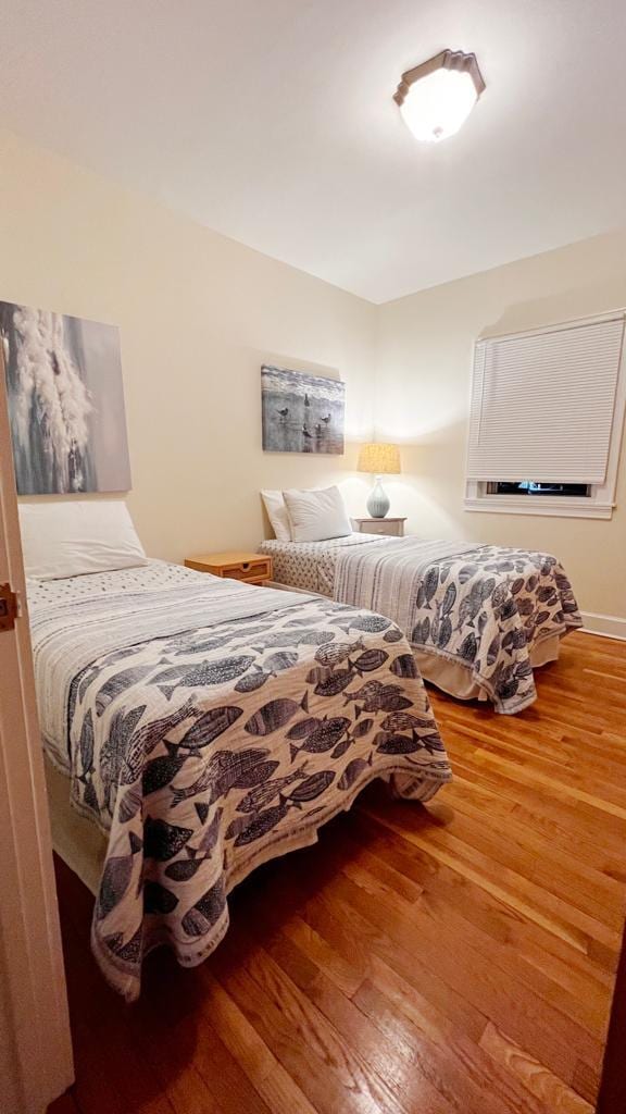 bedroom featuring hardwood / wood-style flooring