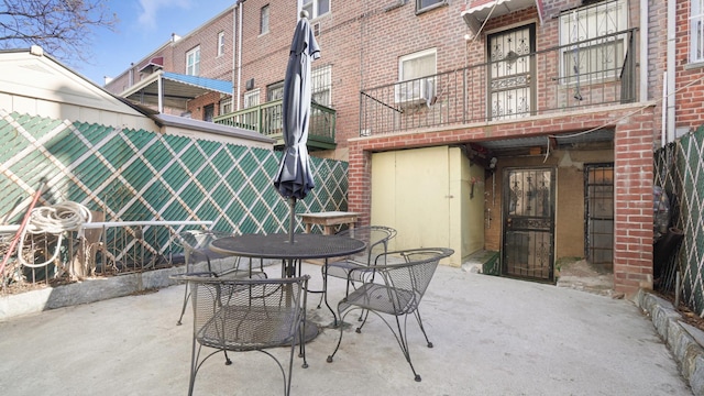 view of patio / terrace featuring a balcony